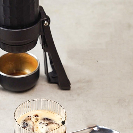 Three Generations Of Portable Coffee Machines Go Outdoors